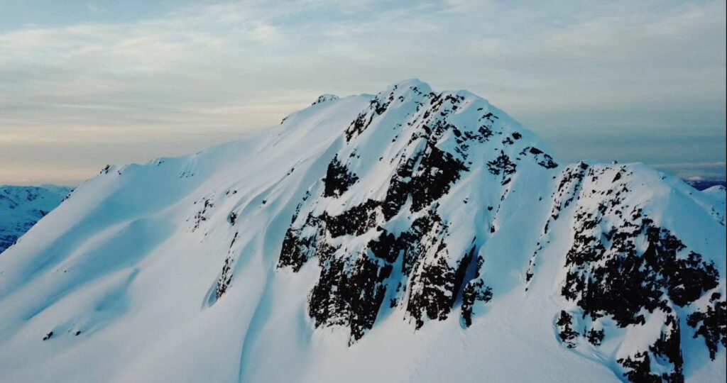 an aerial view in the Chugach Mountains of Alaska in winter for a ski touring camp